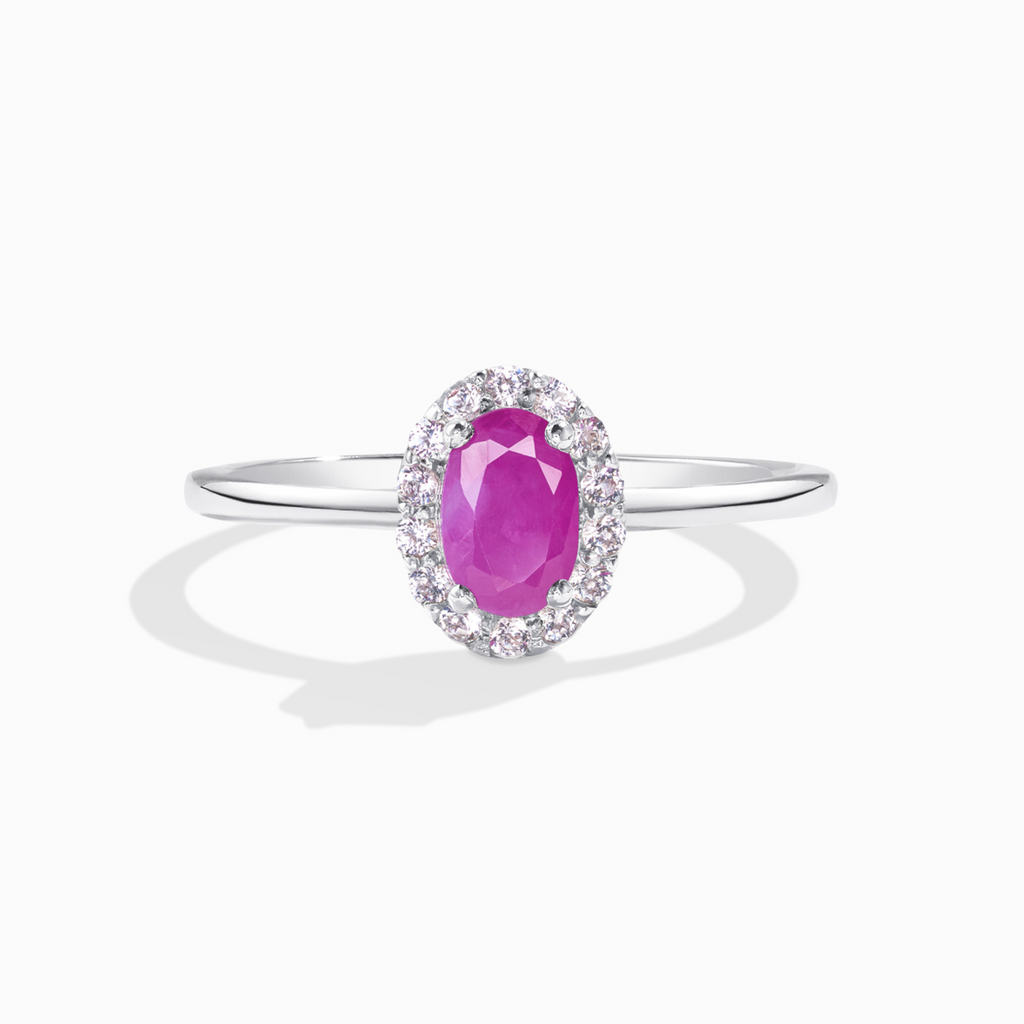 Ruby ring in sterling silver on white background