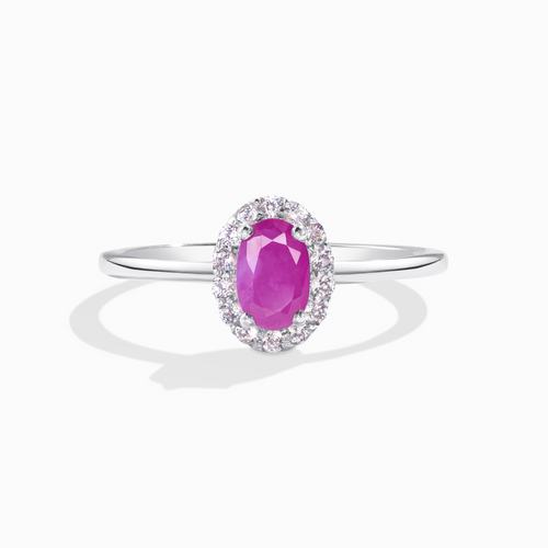 Ruby ring in sterling silver on white background