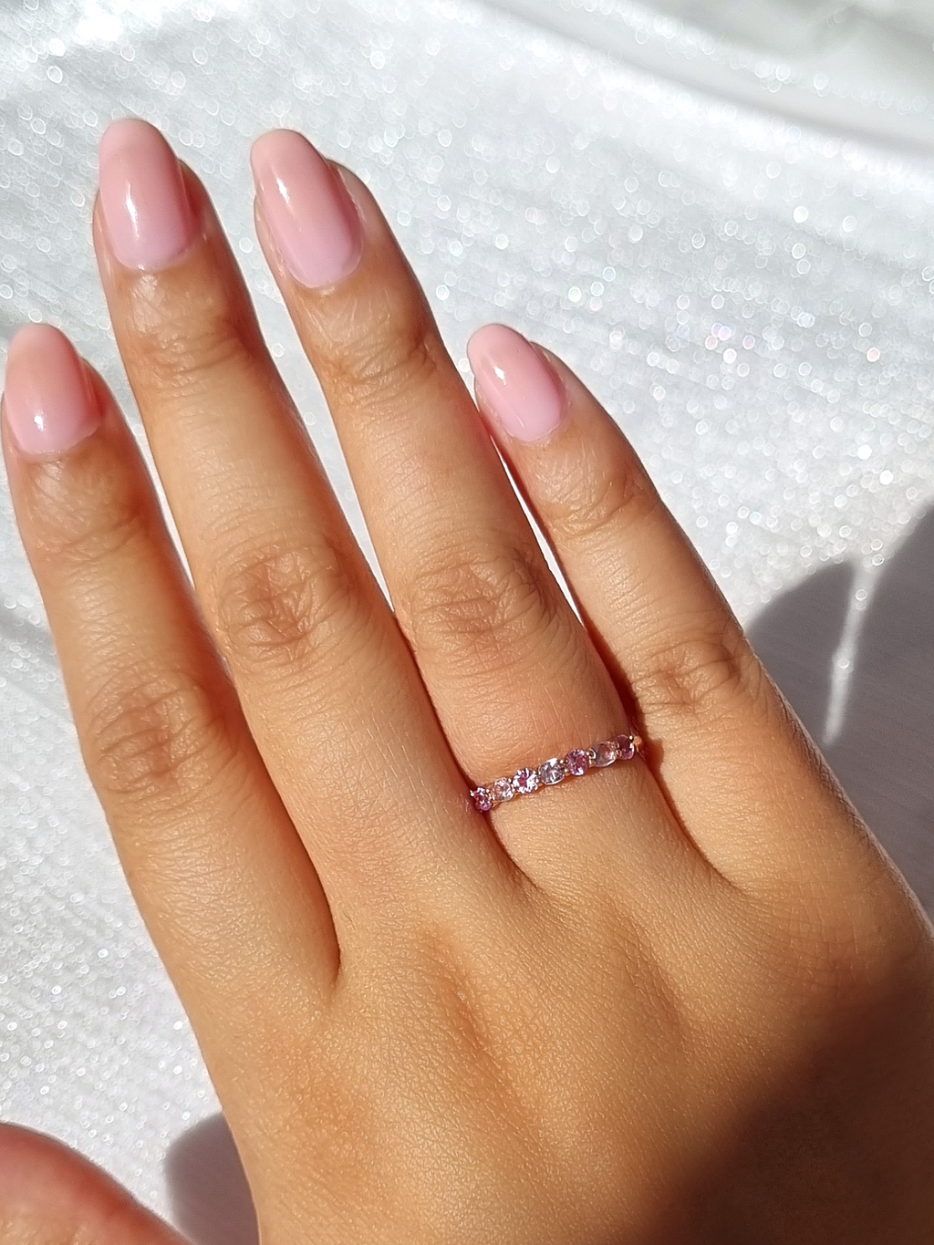 Pink sapphire and pink amethyst ring in sterling silver full hand image