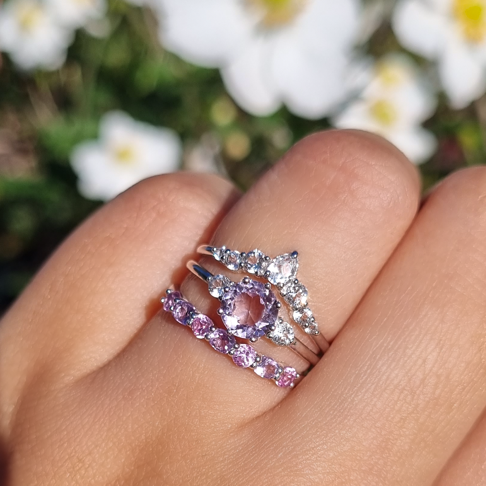 Pink sapphire and pink amethyst half eternity band stacked with lavender amethyst ring set