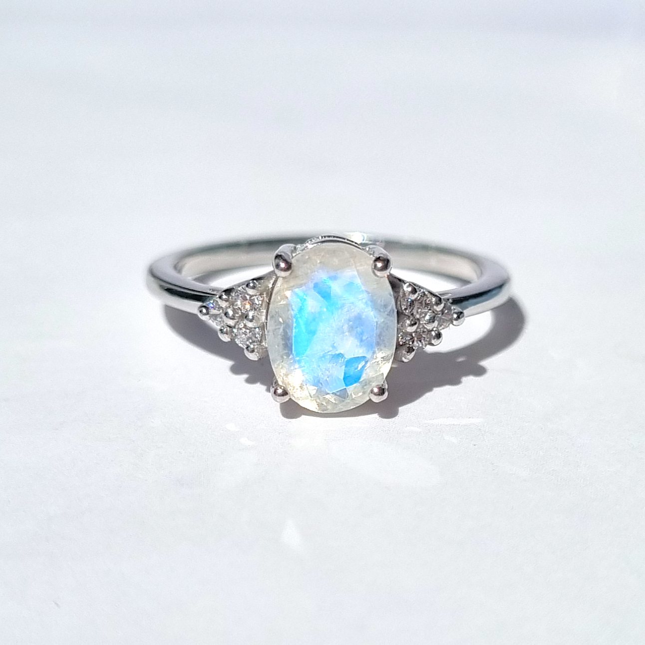 Rainbow moonstone oval cut ring in sterling silver product detail image