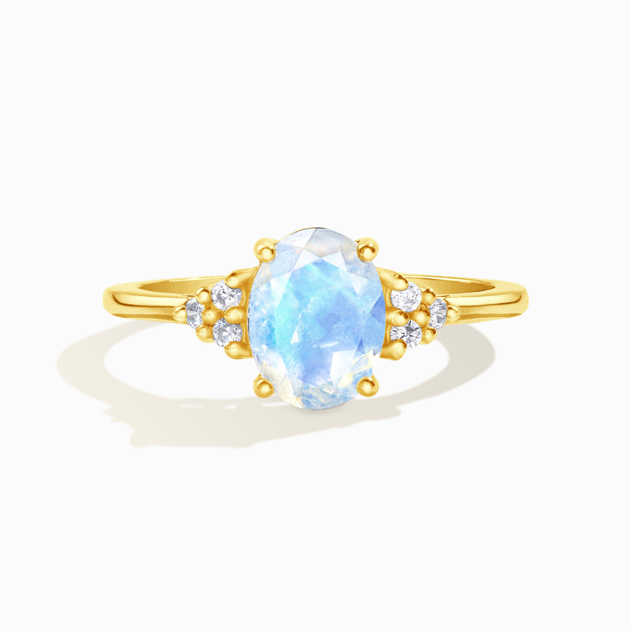 Rainbow moonstone oval cut ring in 18k gold vermeil on white background