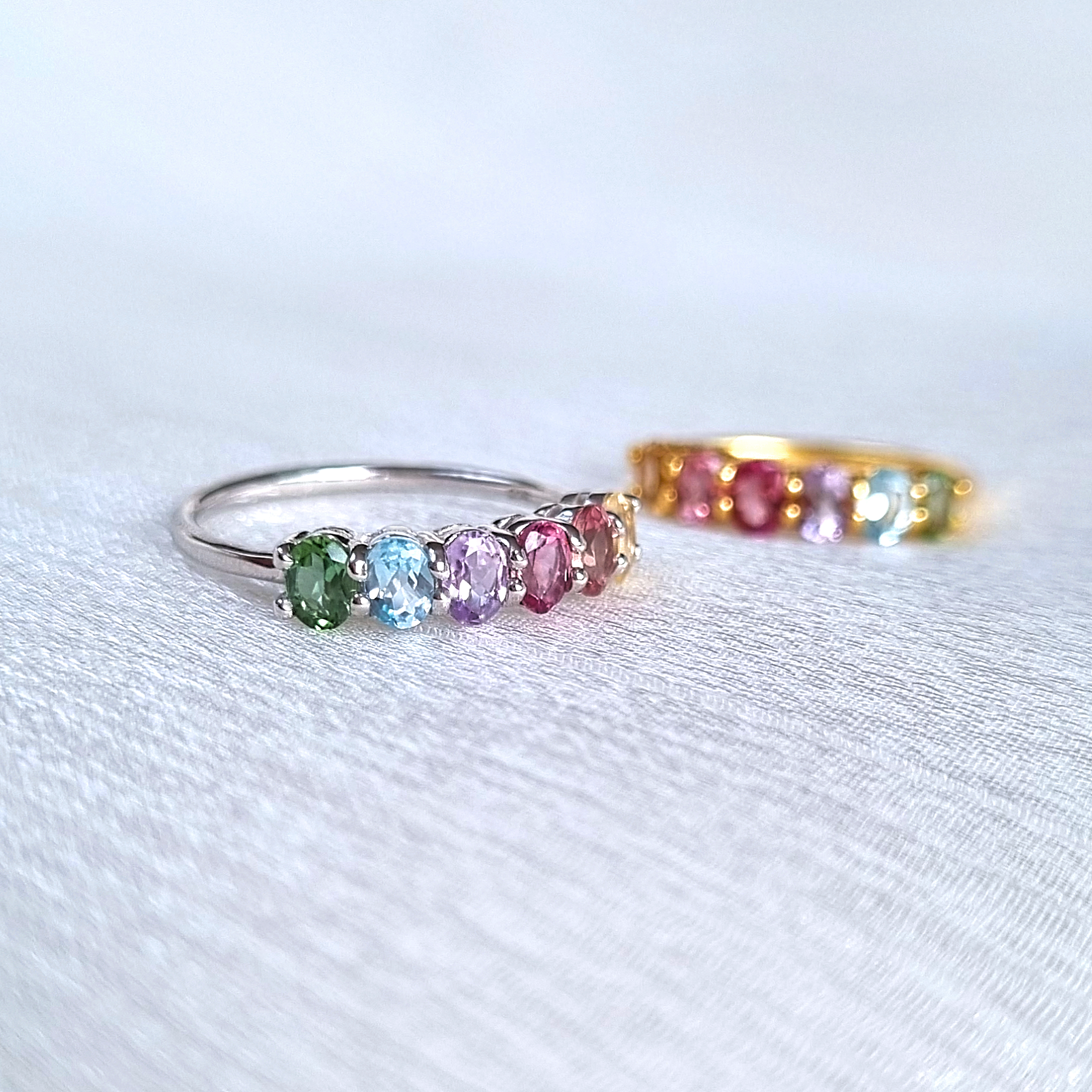 Rainbow multicoloured gemstone half eternity rings in gold vermeil and sterling silver product group