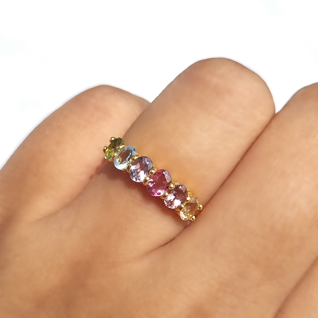 Rainbow multicoloured gemstone half eternity ring in 18k gold vermeil on hand