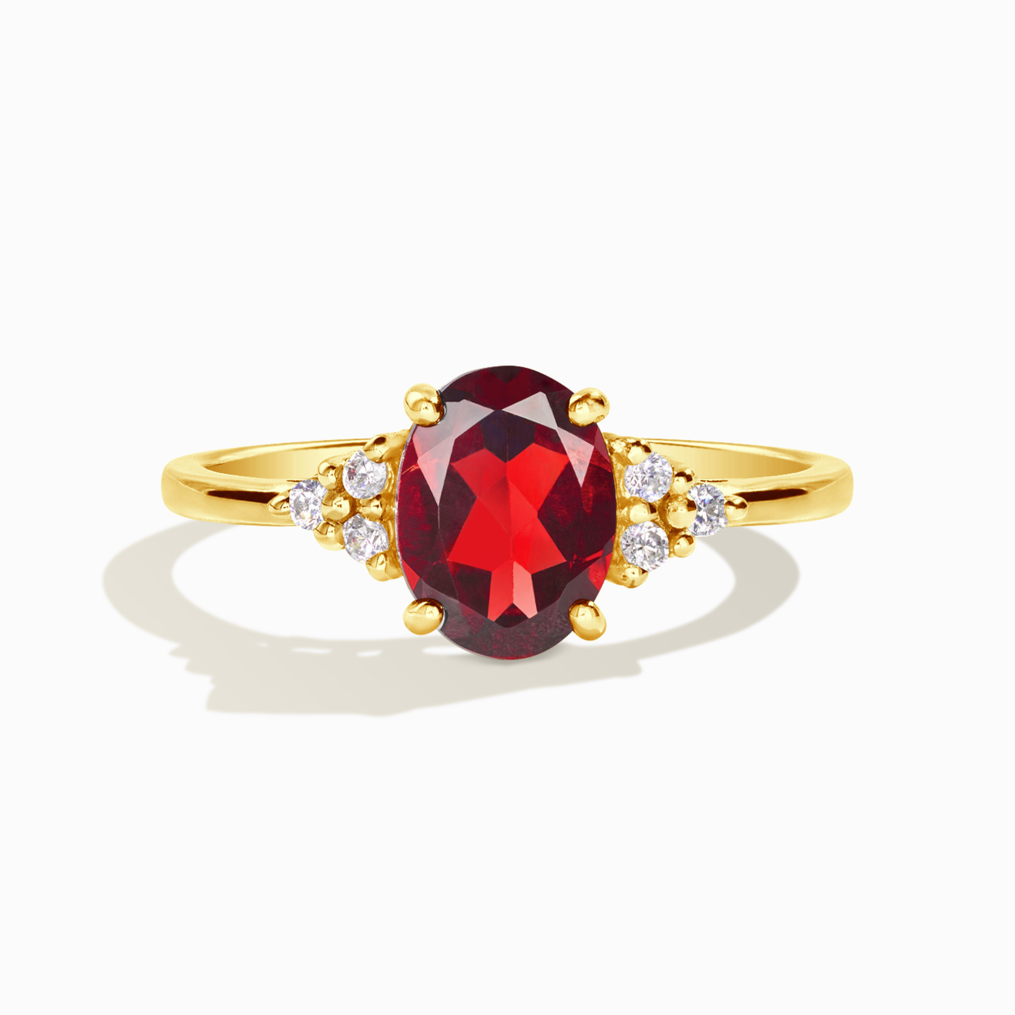 Garnet ring in 18k gold vermeil on white background