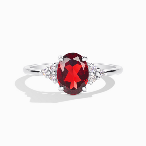 Garnet ring in sterling silver on white background