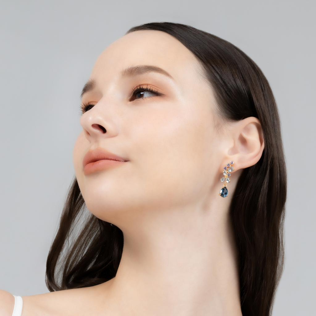Blue gemstone drop earrings in 18k gold vermeil on model