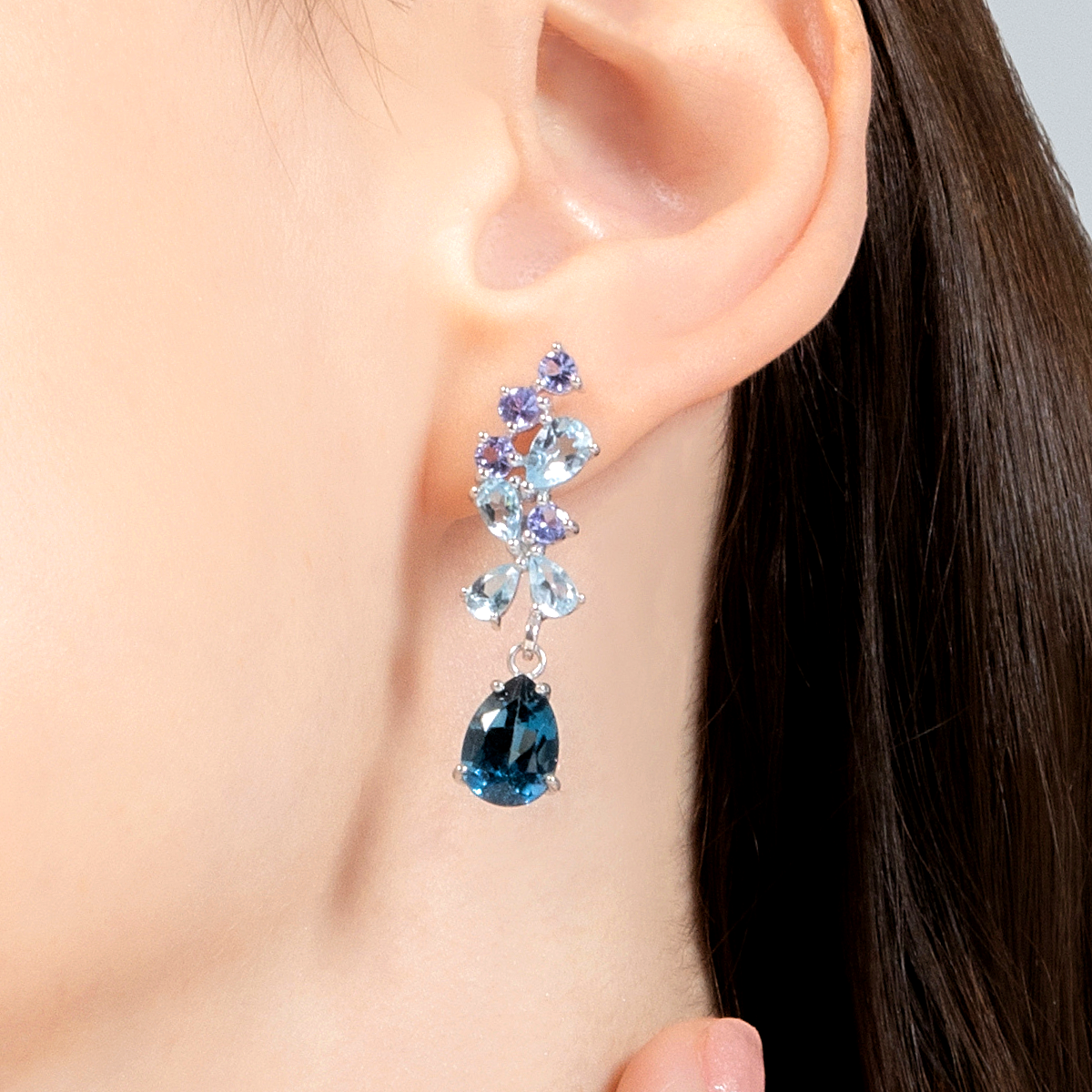 Blue gemstone drop earrings in sterling silver model image