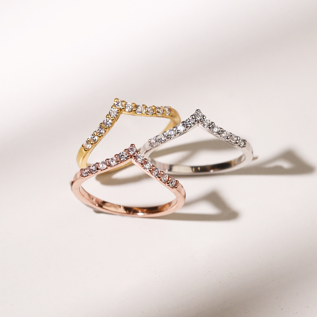 Wishbone curved eternity rings group lifestyle image
