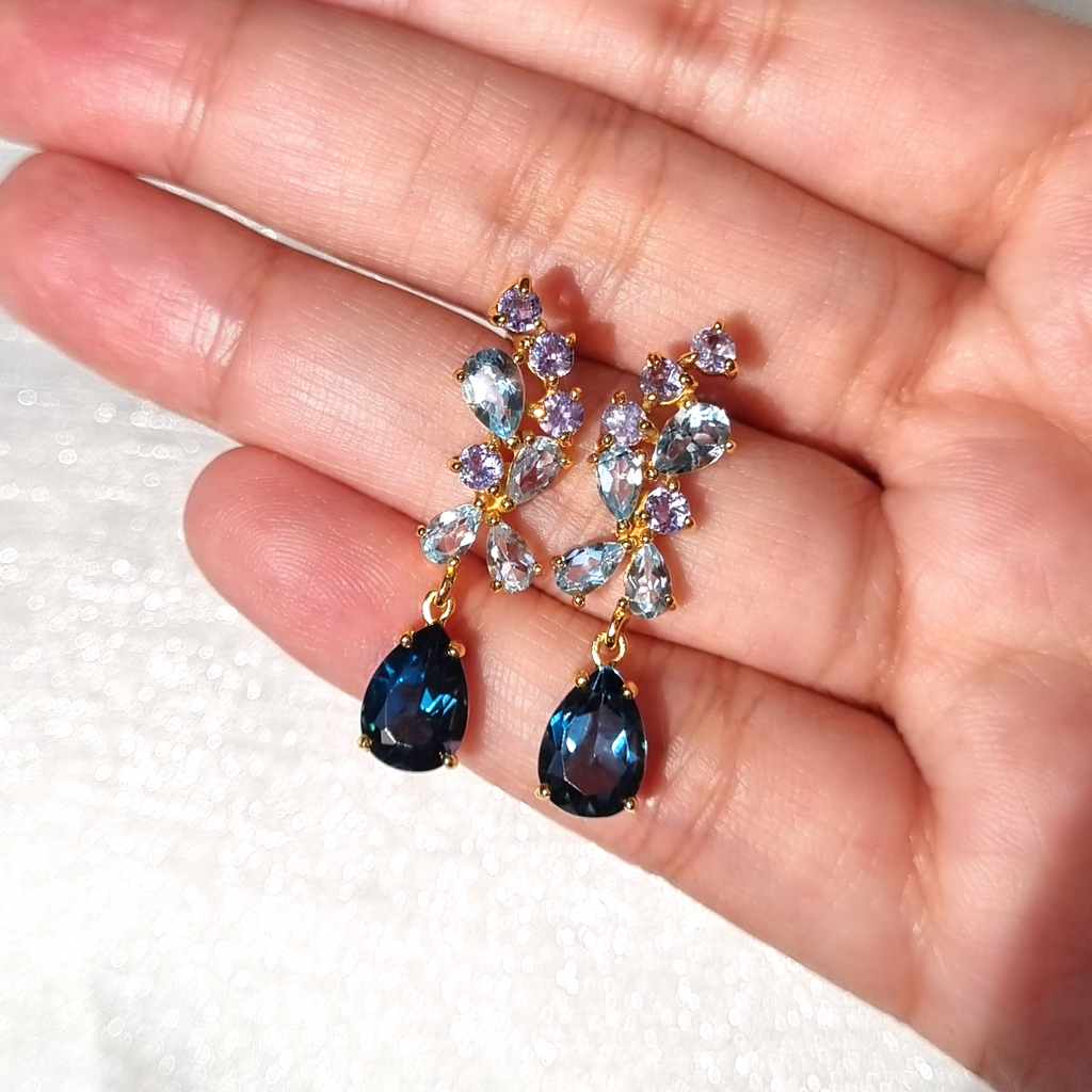 Blue gemstone drop earrings in 18k gold vermeil detail lifestyle image