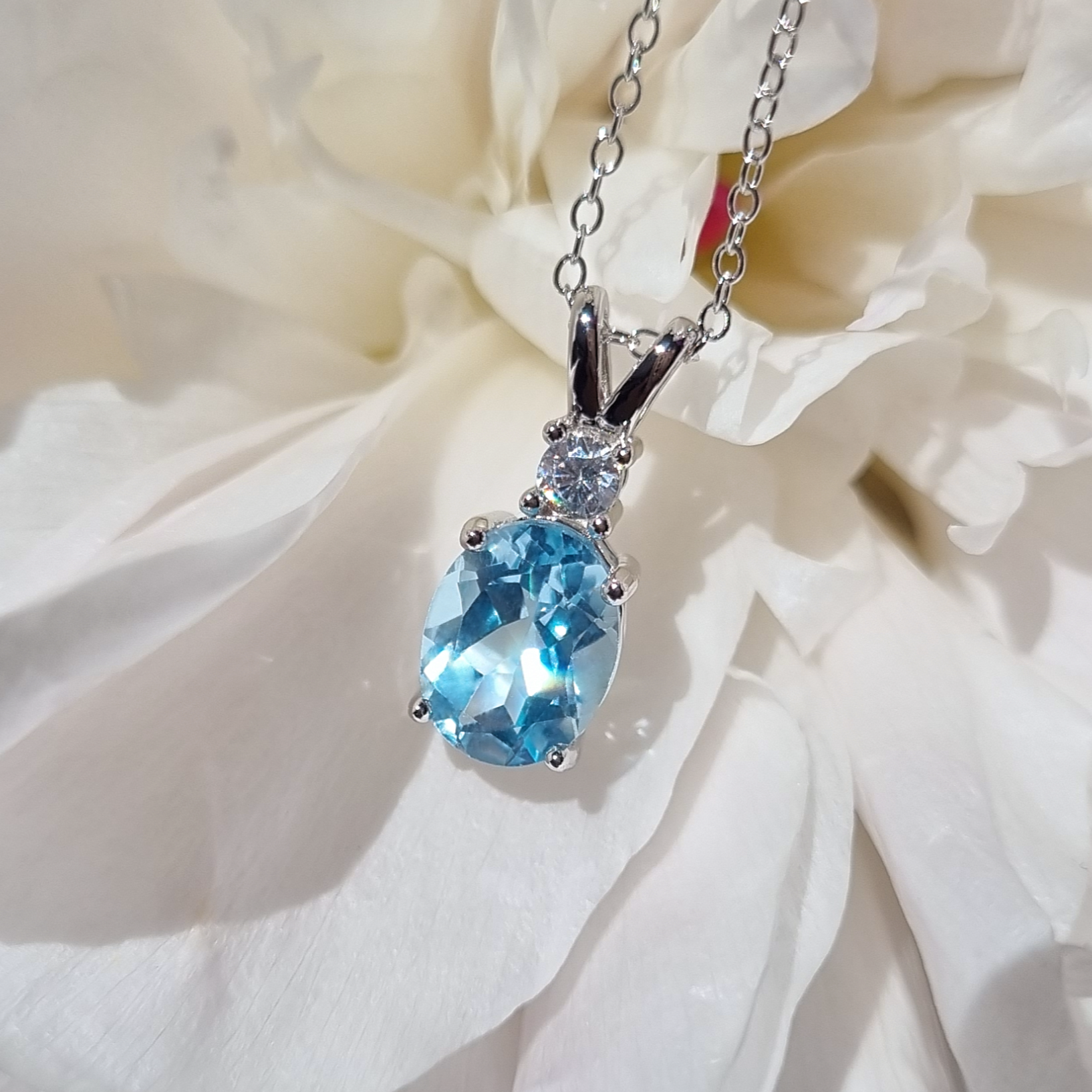 Blue topaz pendant necklace in sterling silver product image