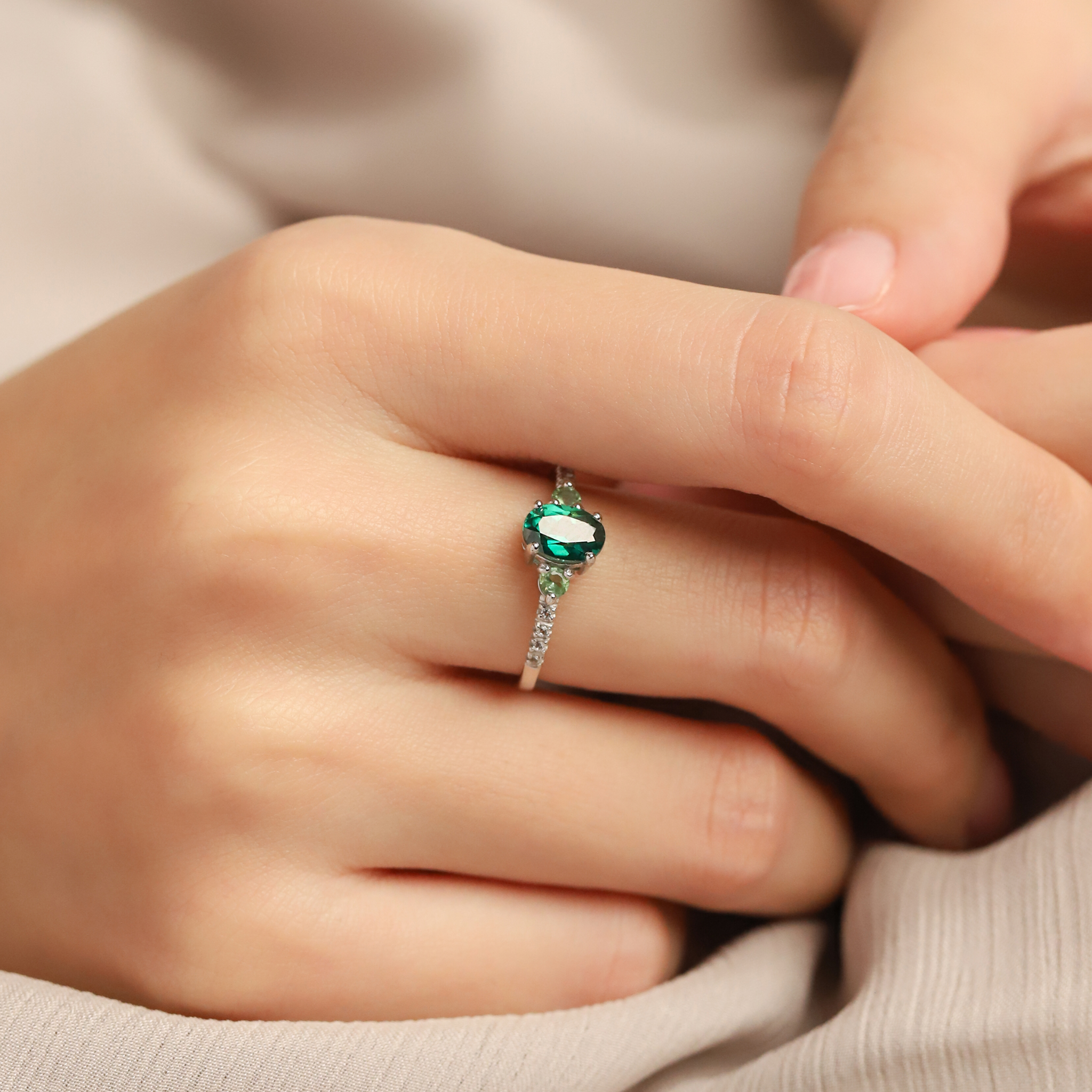 Green topaz ring and ombre green tourmaline band in sterling silver on hand
