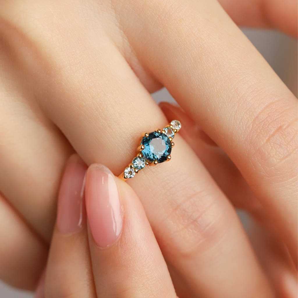 Ombre blue topaz five stone ring in 18k gold vermeil on hand