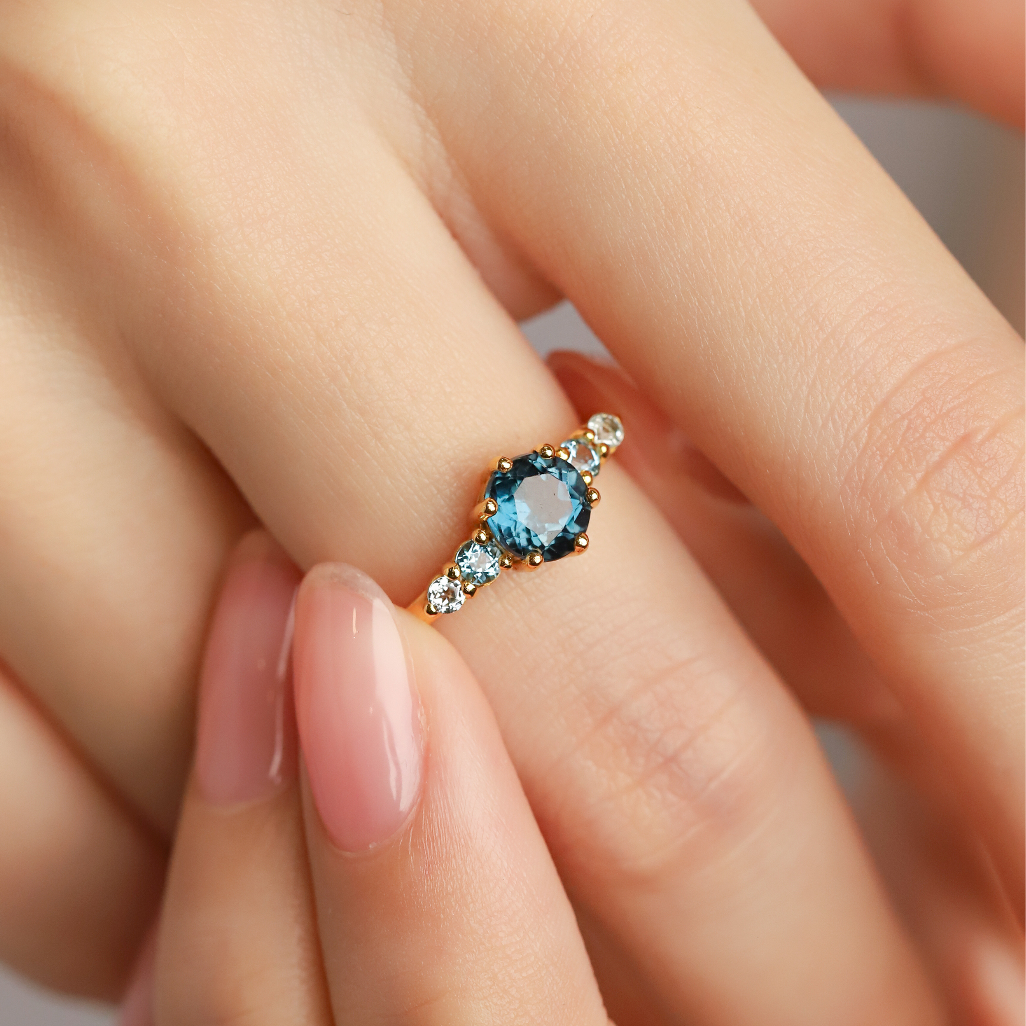 Ombre blue topaz five stone ring in 18k gold vermeil on hand