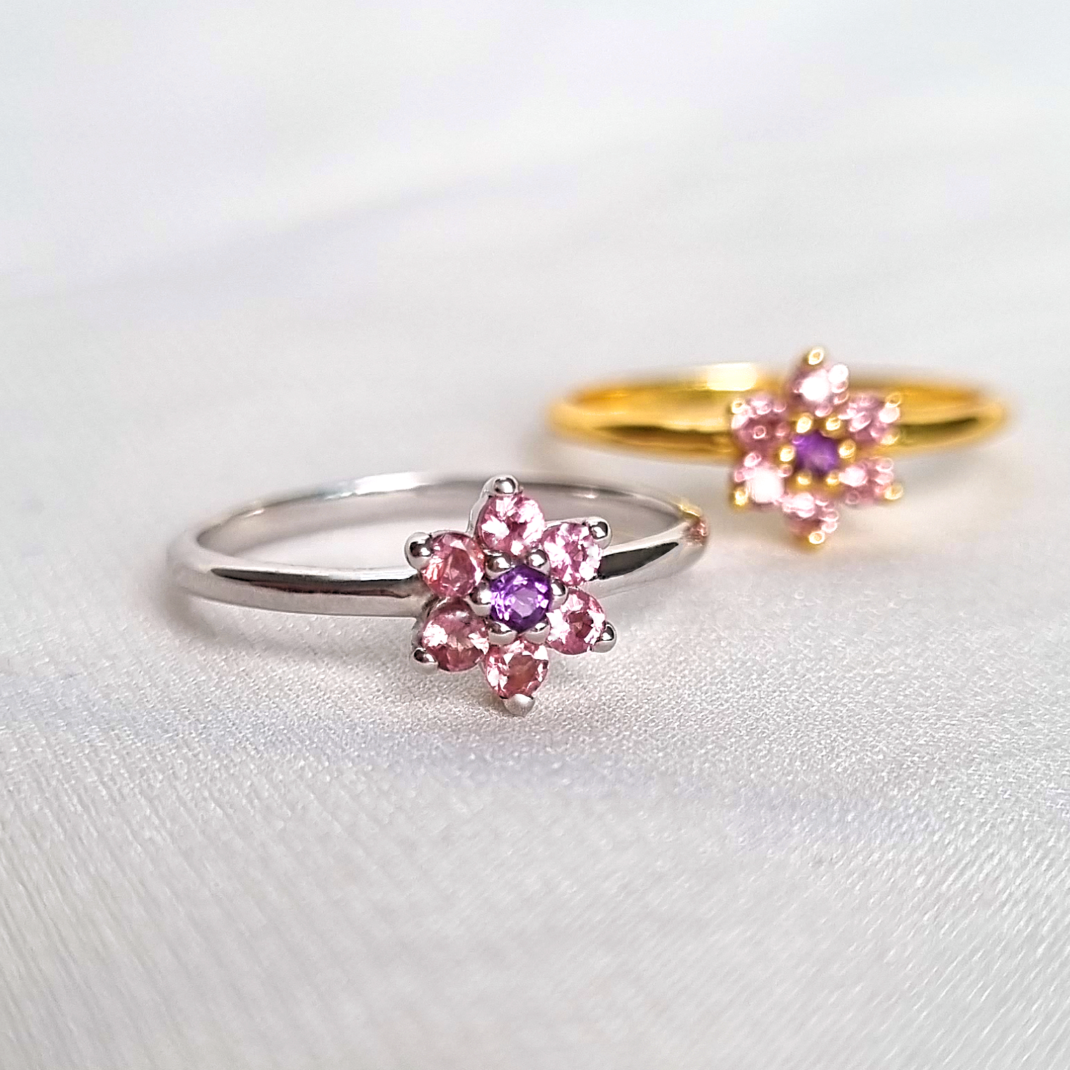 Pink tourmaline and amethyst flower rings in sterling silver lifestyle image