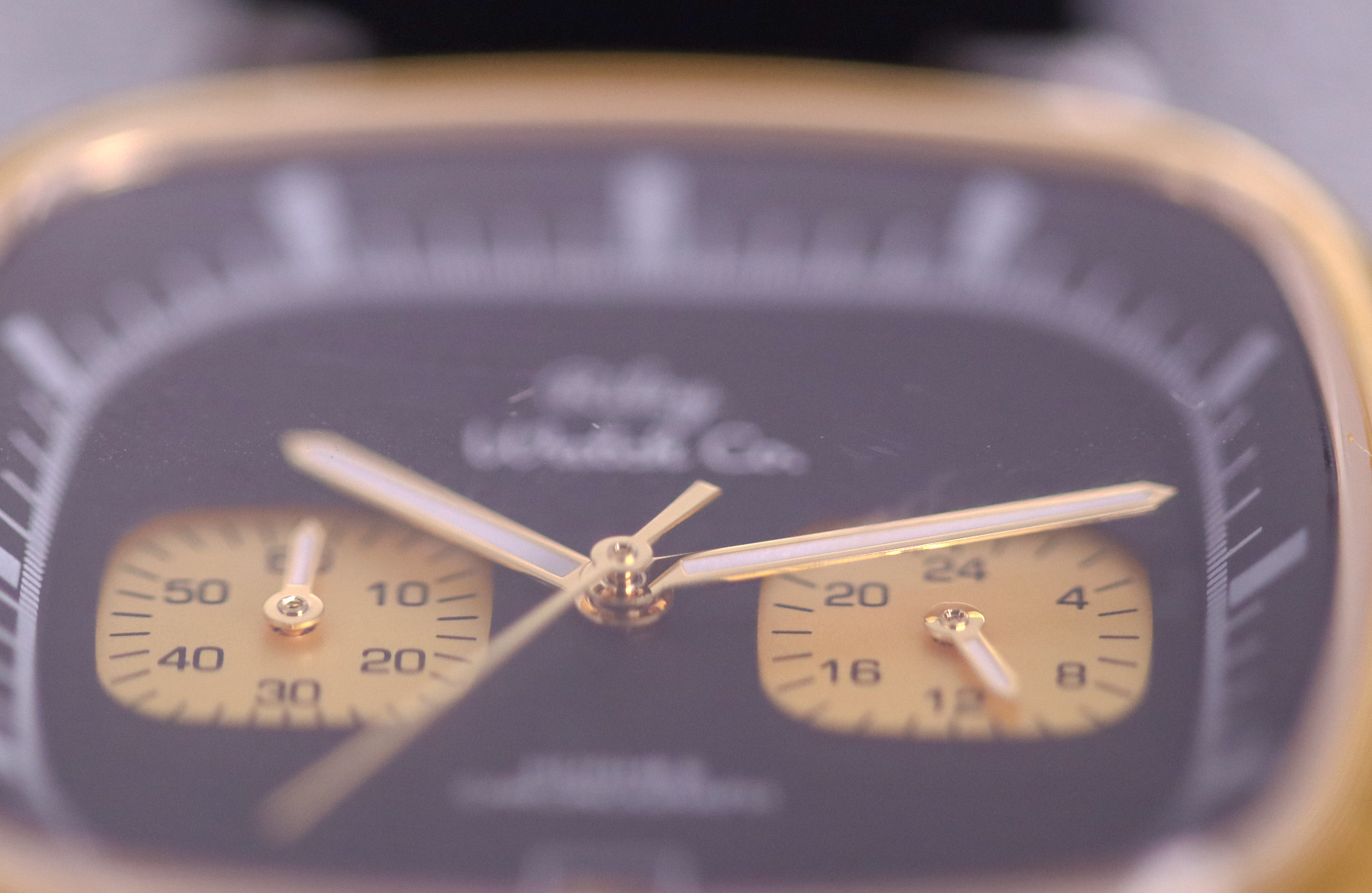 Gold chronograph watch product image