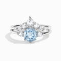 Selene blue topaz ring set in sterling silver on white background