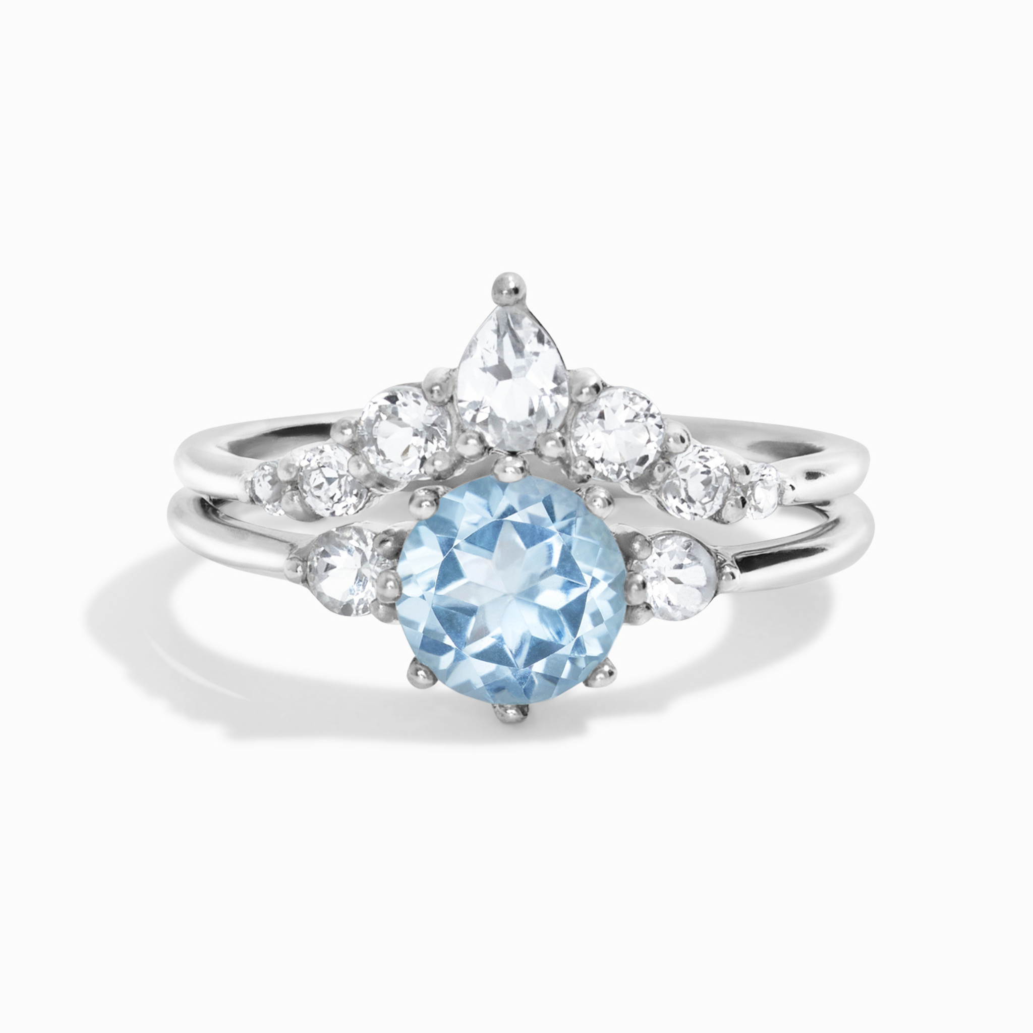 Selene blue topaz ring set in sterling silver on white background