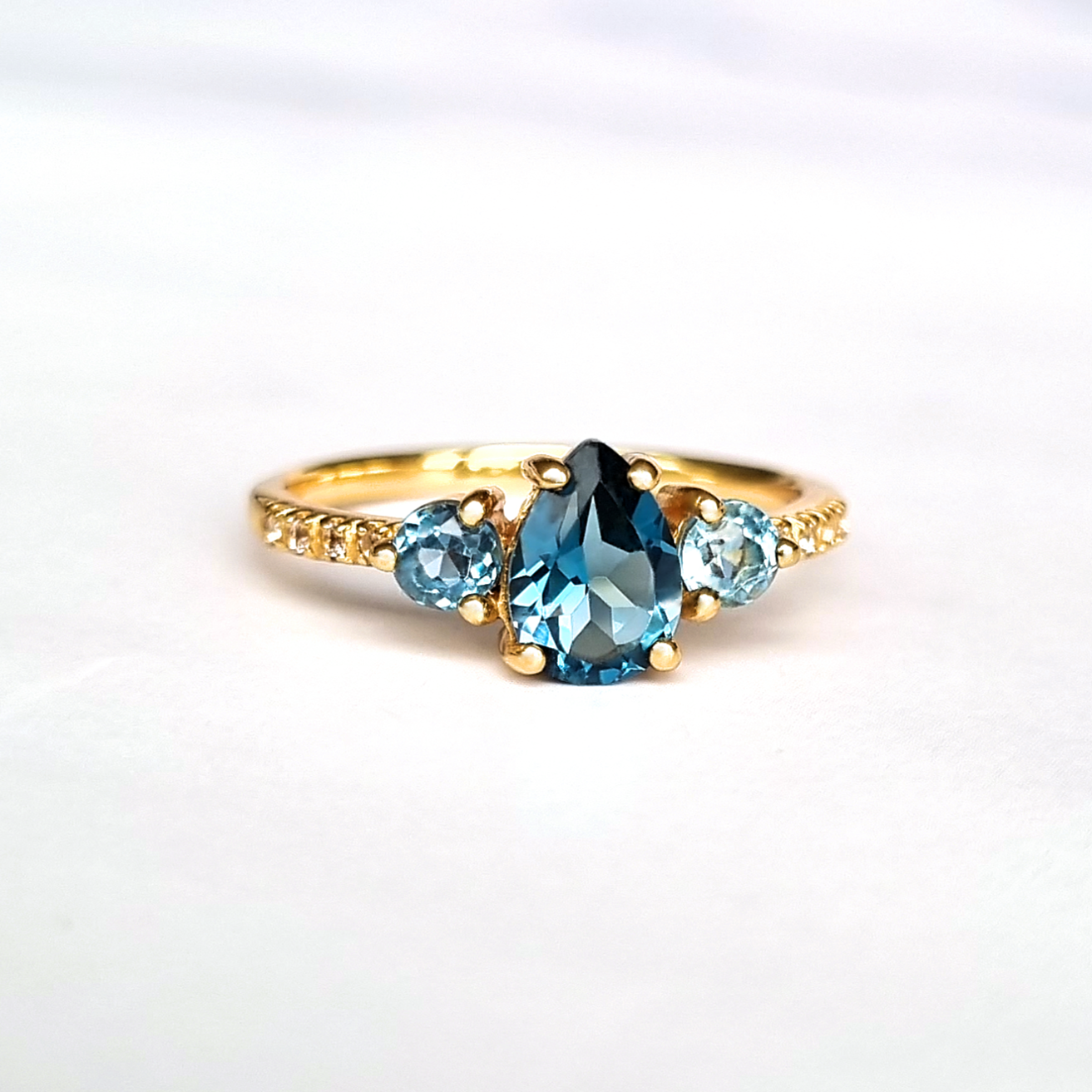London blue and Swiss blue topaz pear cut ring in 18k gold vermeil detail image