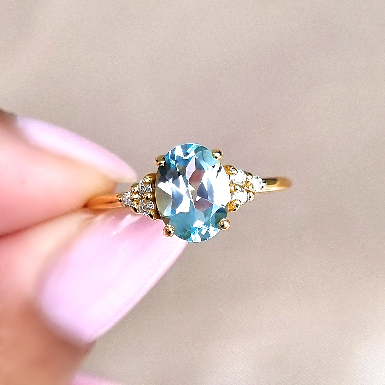 Sky blue topaz oval cut ring in 18k gold vermeil lifestyle image