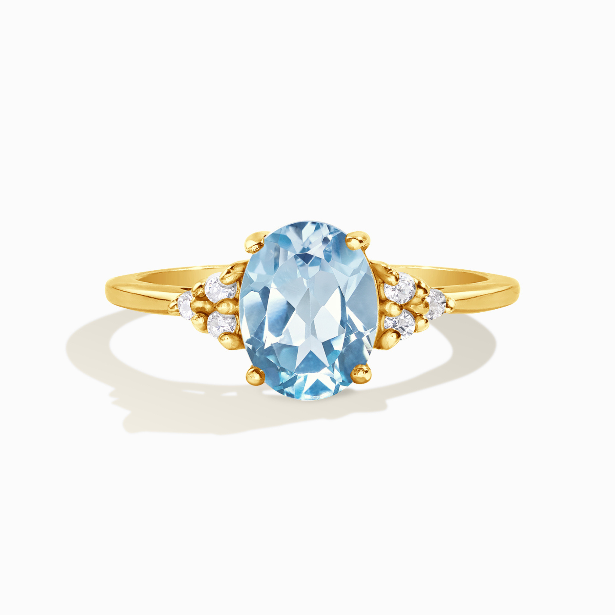 Sky blue topaz ring in 18k gold vermeil on white background