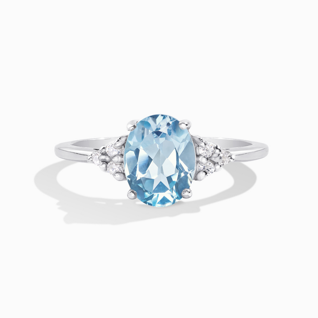 Sky blue topaz ring in sterling silver on white background
