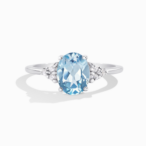Sky blue topaz ring in sterling silver on white background