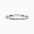 Slim full eternity ring with 1.2mm sterling silver band on white background