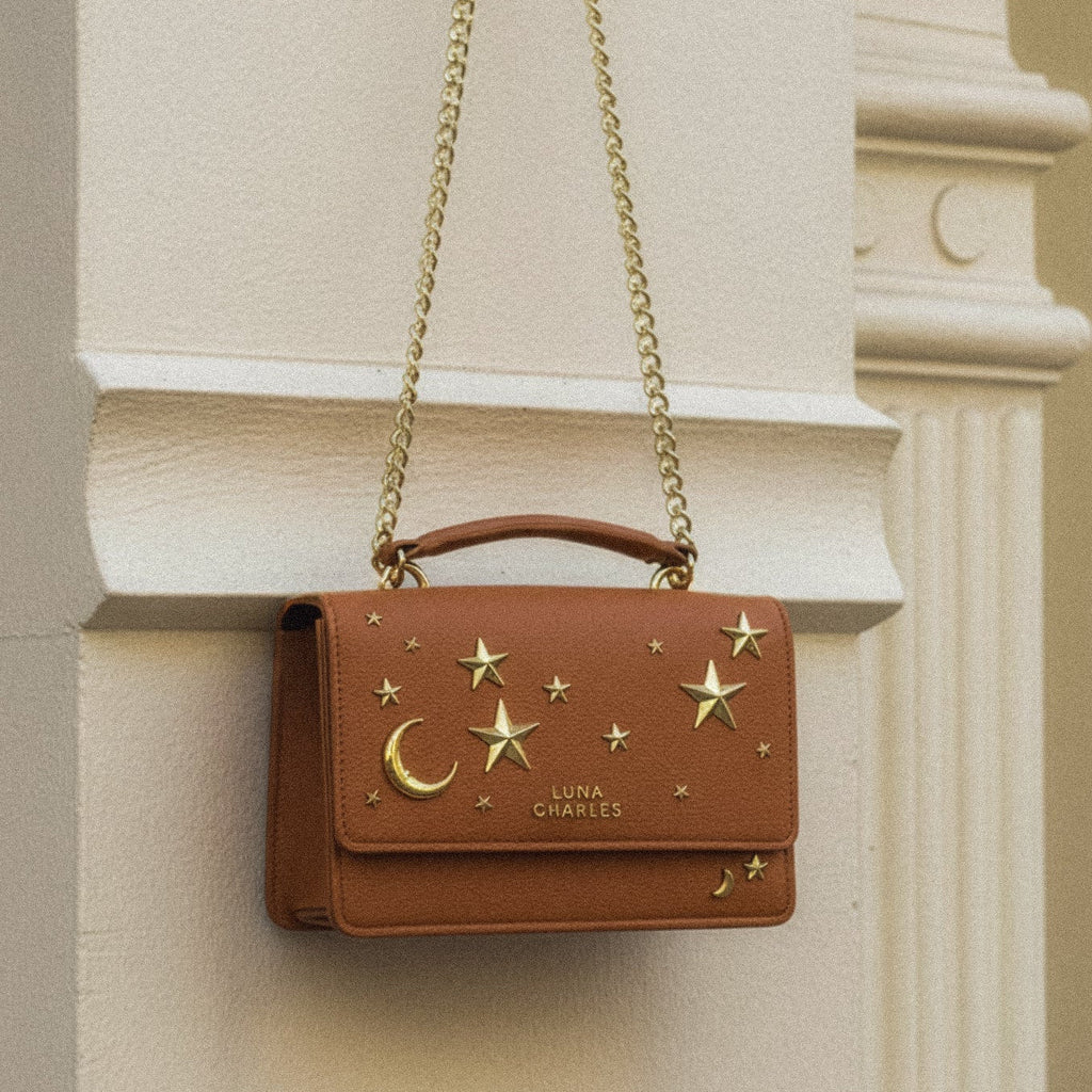 Luna Charles Nova tan and gold crossbody bag close-up detail