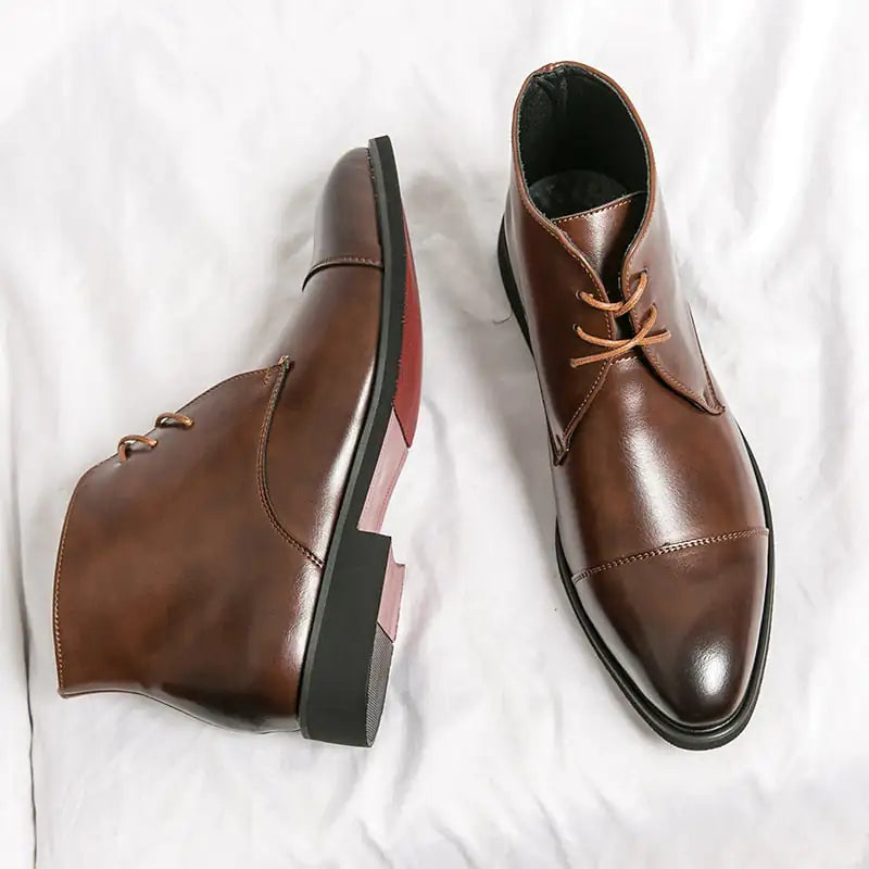 Kenike leather boots red bottom sole close-up