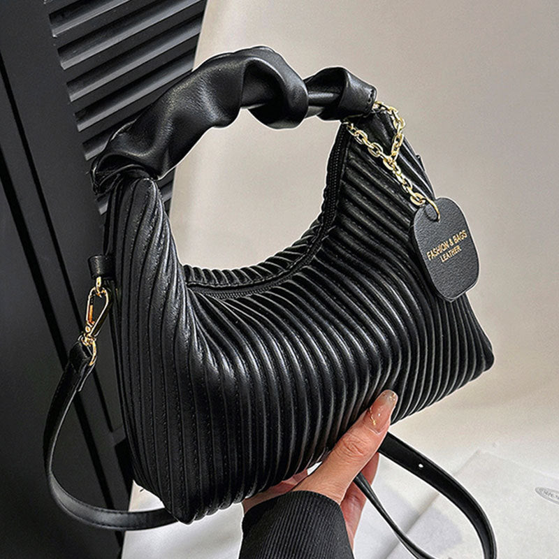 Kenike elegant pleated cloud messenger bag close-up detail