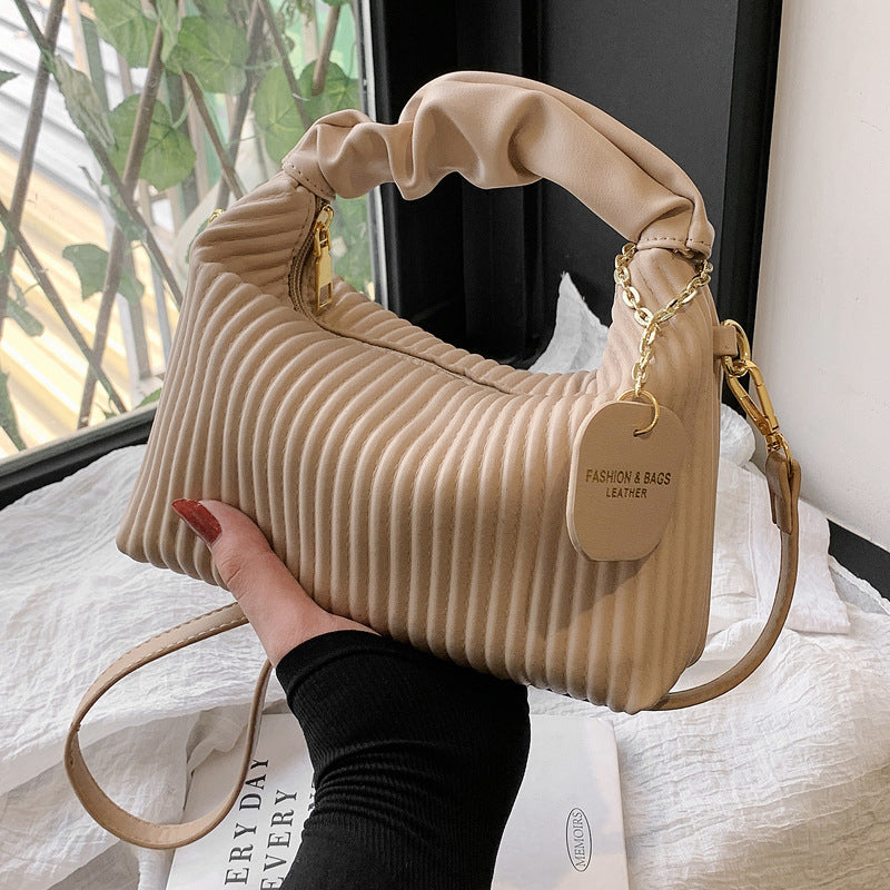 Kenike pleated cloud crossbody bag front view