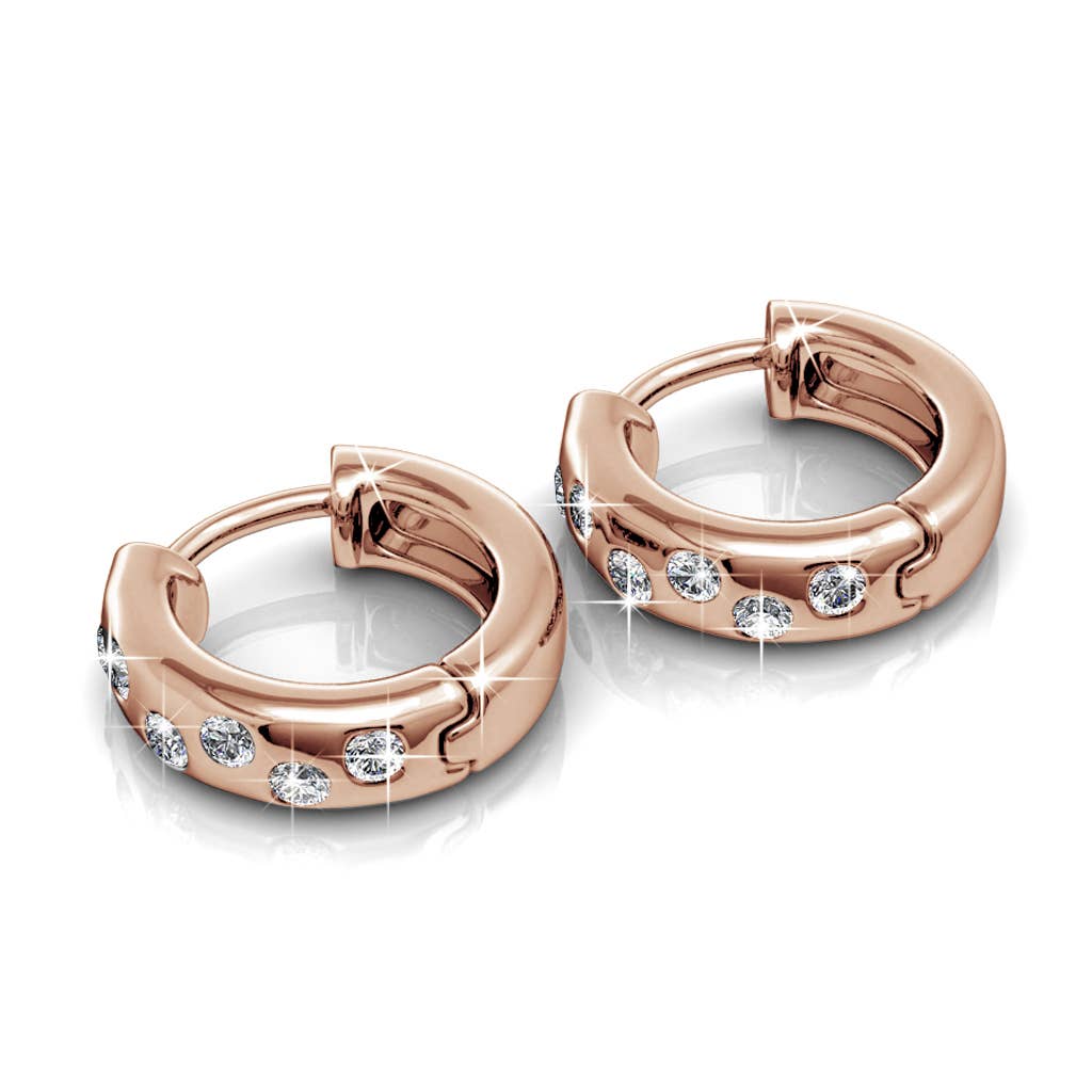 Joy rose gold and crystal earrings close-up detail