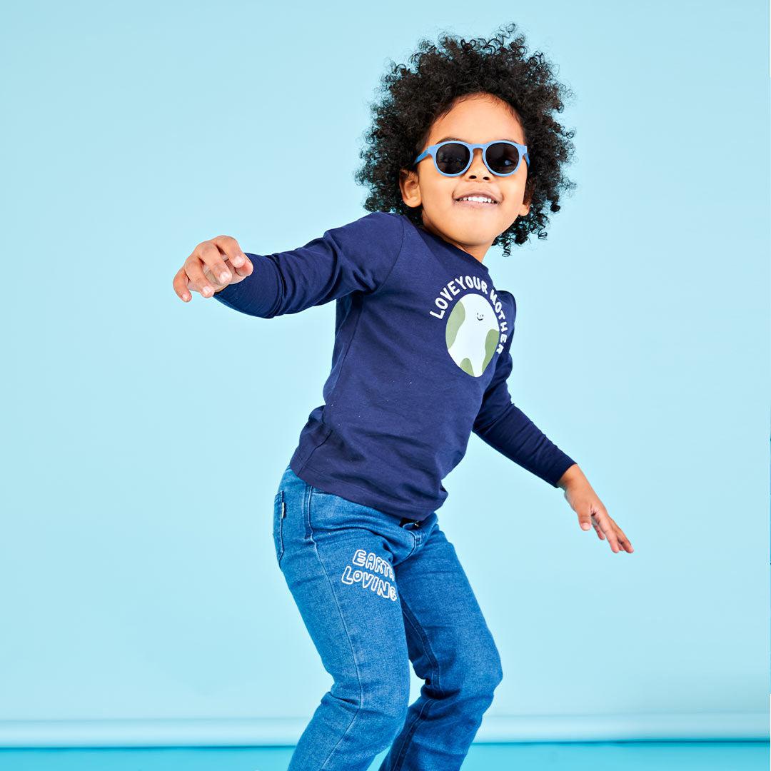 Babiators Eco Original Keyhole Pacific Blue kids sunglasses worn outdoors