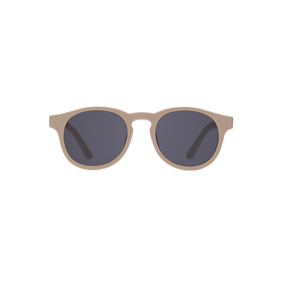 Babiators Eco Original Keyhole kids sunglasses in Soft Sand 3-5 years flat lay