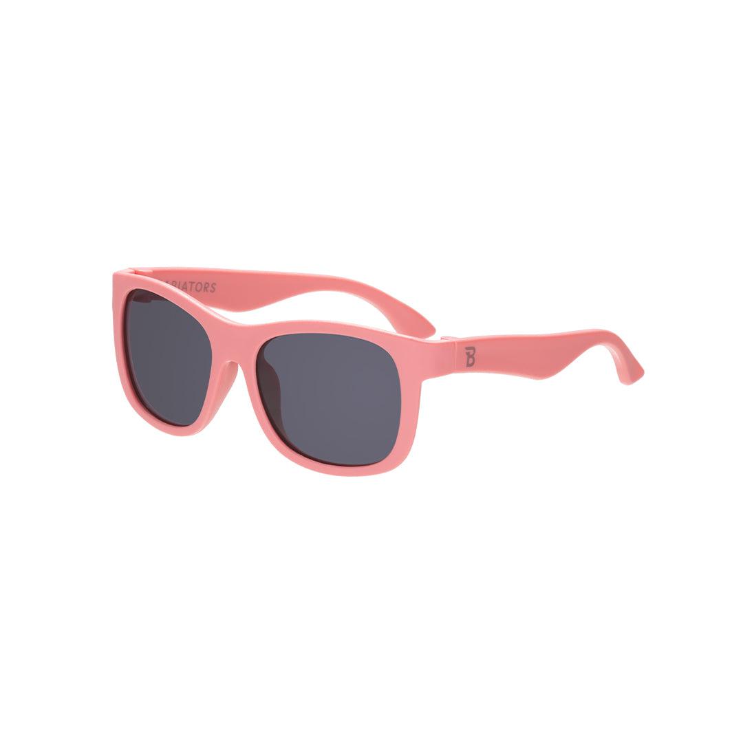 Babiators Eco Original Navigator kids sunglasses in Seashell Pink 0-2 years flat lay