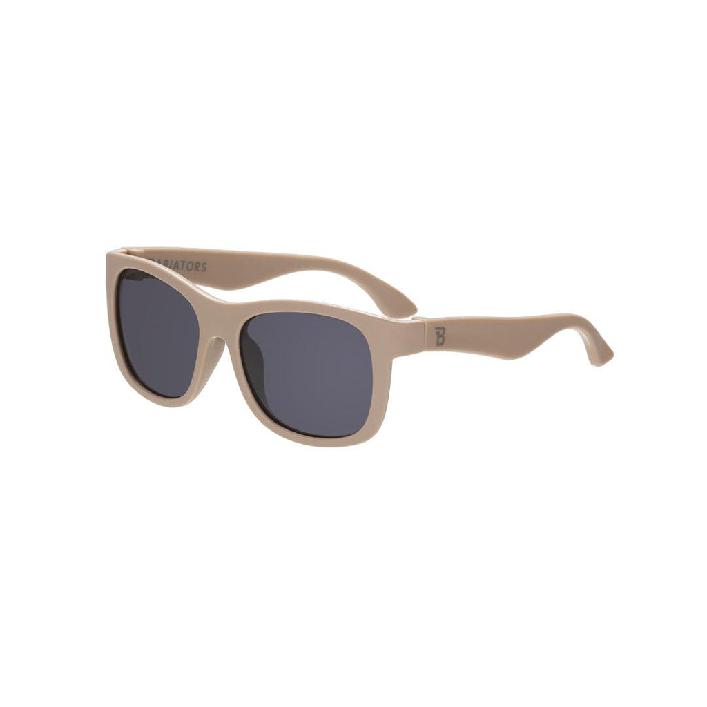 Babiators Eco Original Navigator kids sunglasses in Soft Sand 0-2 years flat lay