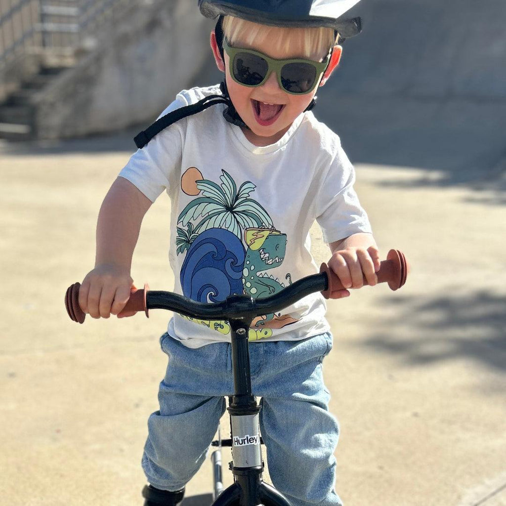 Babiators Eco Original Navigator Wild Moss kids sunglasses worn outdoors