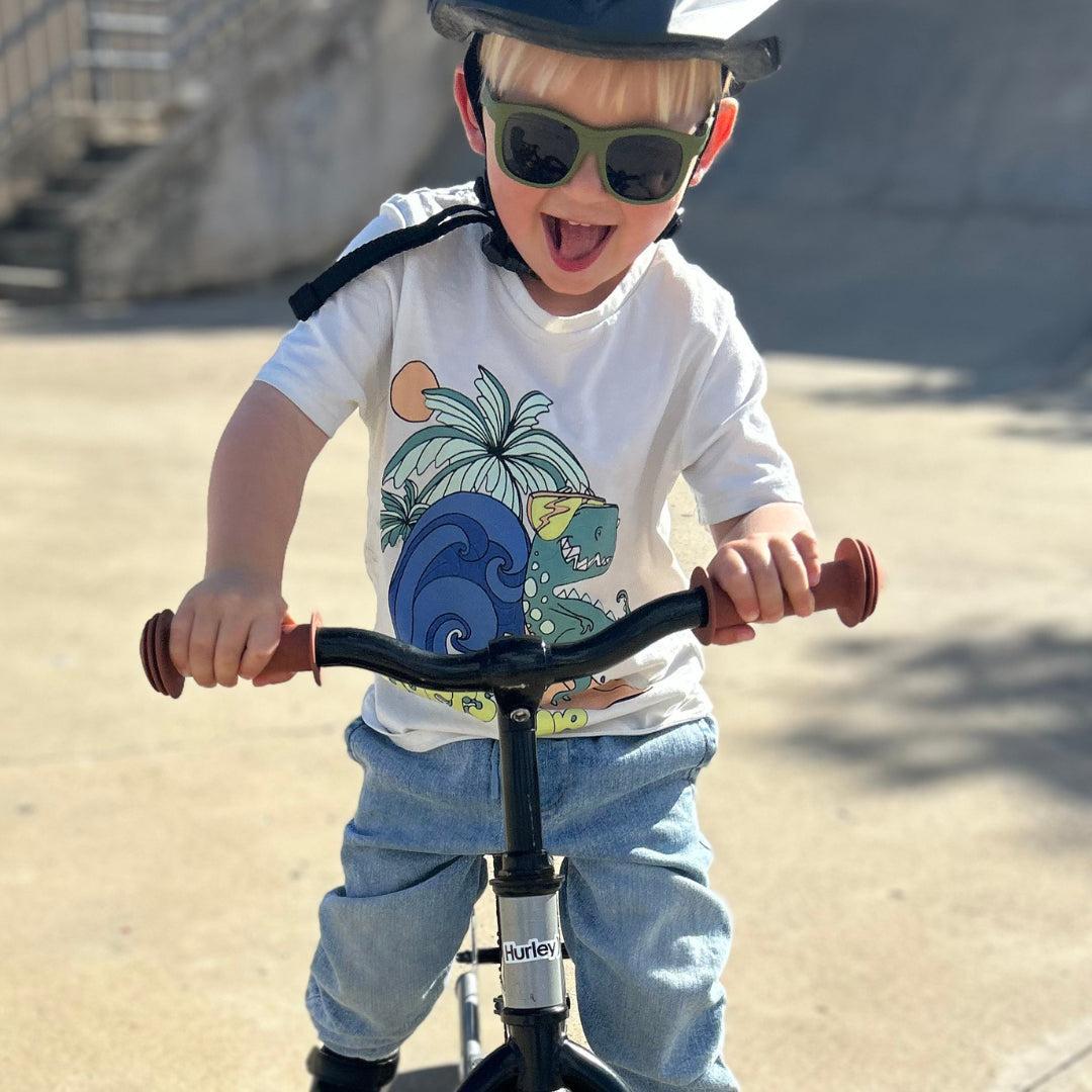 Babiators Eco Original Navigator Wild Moss kids sunglasses worn outdoors