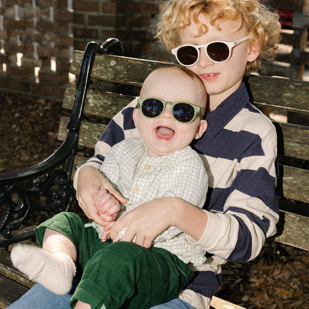 Babiators Eco Original Keyhole Wild Moss kids sunglasses worn outdoors