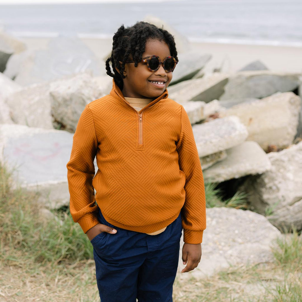 Babiators Original Euro Round Totally Tortoise kids sunglasses worn outdoors