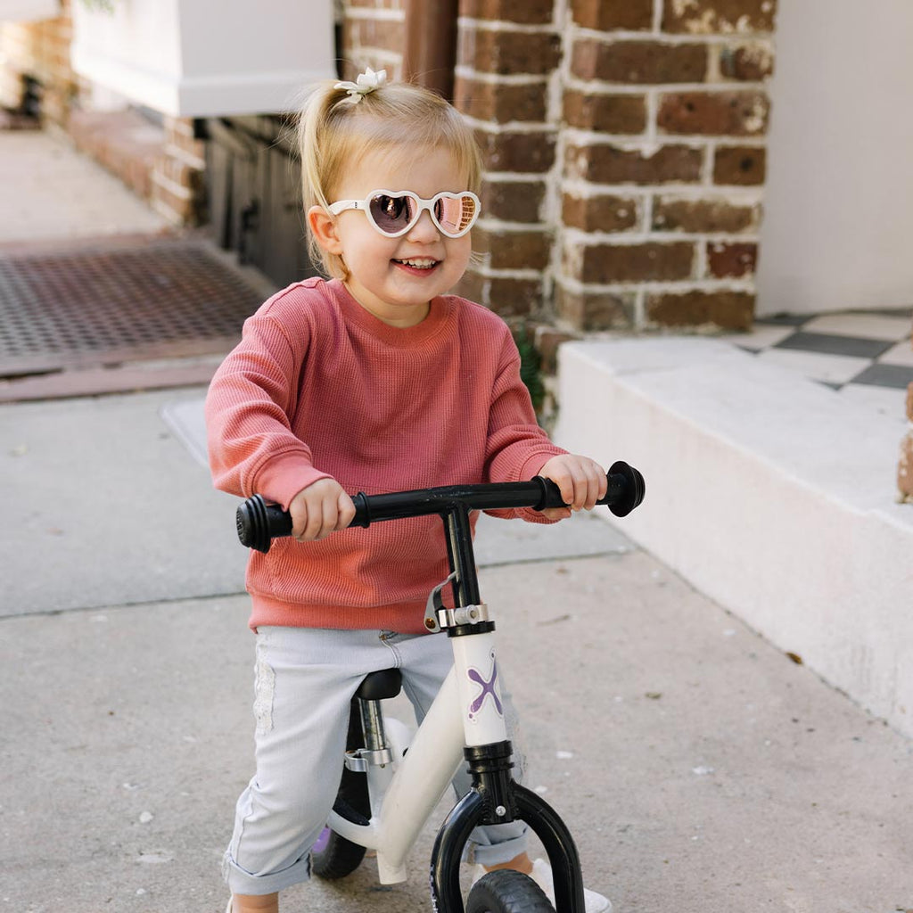 Babiators Polarised Heart Sweet Cream sunglasses lifestyle image