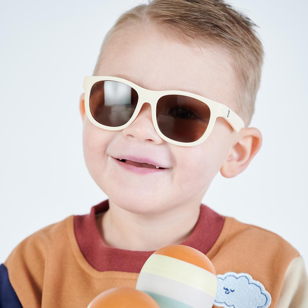 Babiators Original Navigator Sweet Cream kids sunglasses worn outdoors