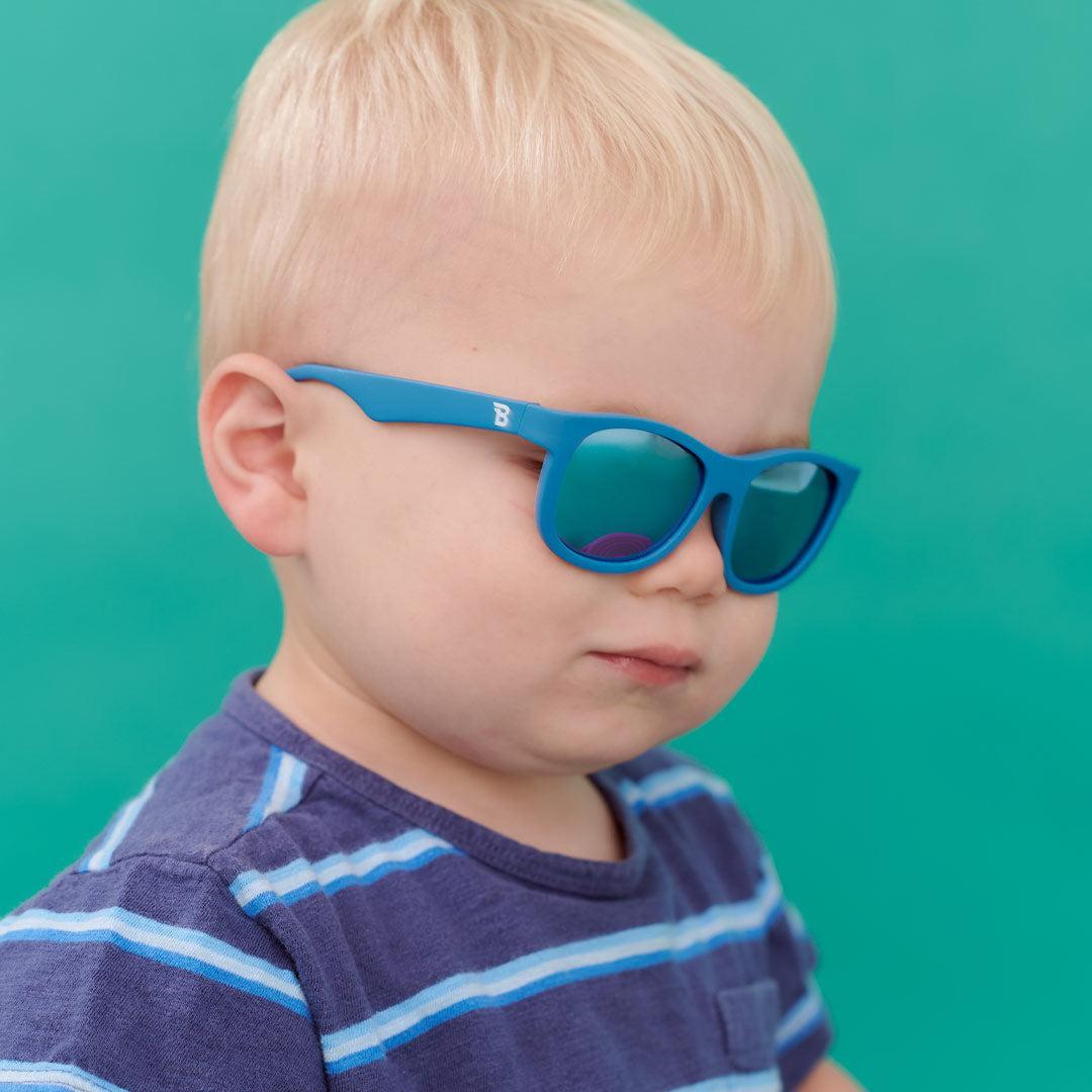 Babiators Polarised Navigator Midnight Blue kids sunglasses worn outdoors