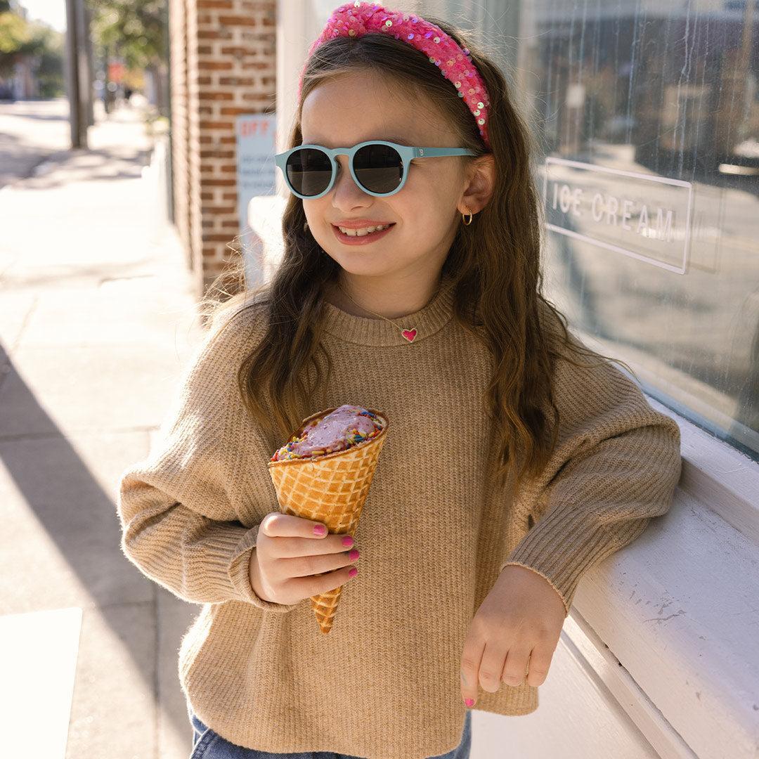 Babiators Original Keyhole Morning Glory kids sunglasses worn outdoors