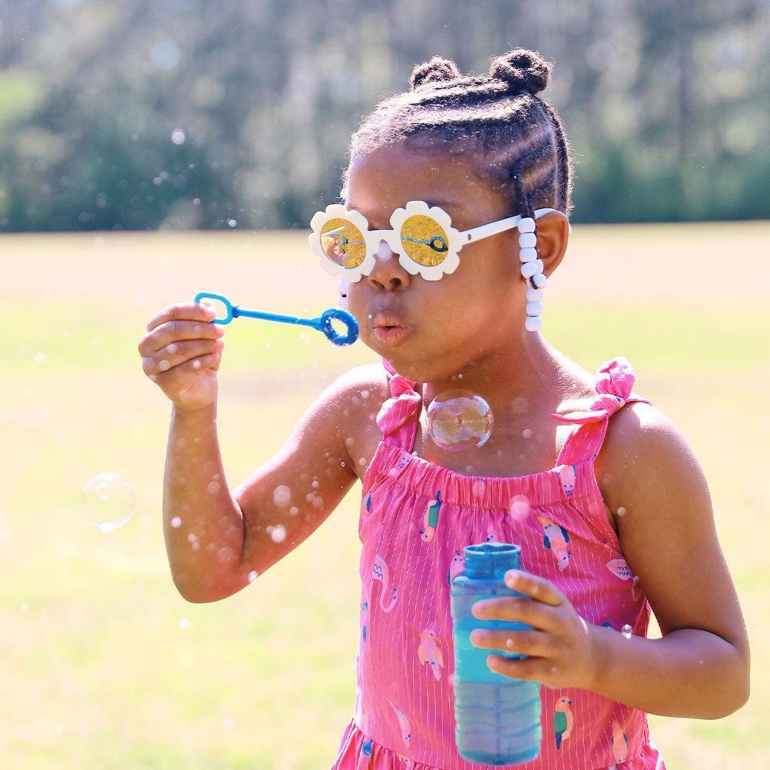 Babiators Polarised Flower Daisy sunglasses close-up lifestyle image