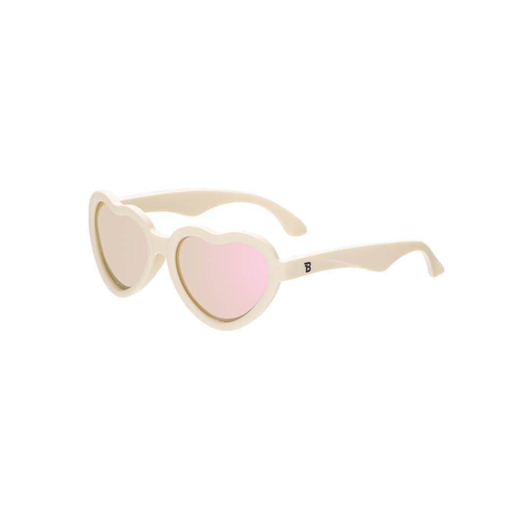 Babiators Polarised Heart kids sunglasses in Sweet Cream 0-2 years flat lay