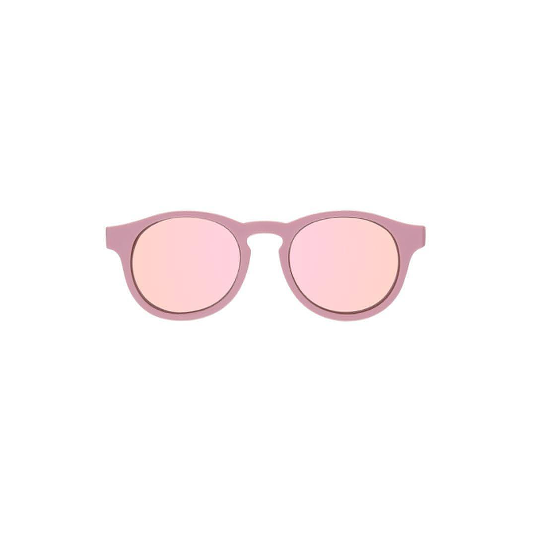 Babiators Polarised Keyhole kids sunglasses in Pretty In Pink 3-5 years flat lay