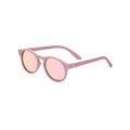 Babiators Polarised Keyhole kids sunglasses in Pretty In Pink 0-2 years flat lay