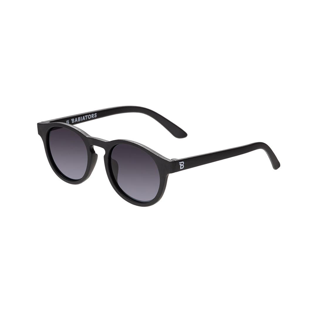 Babiators Polarised Keyhole kids sunglasses in Jet Black Smoke 0-2 years flat lay